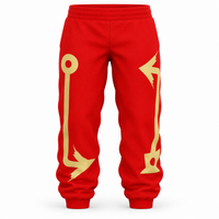 KOLAK red and gold track joggers — original front view